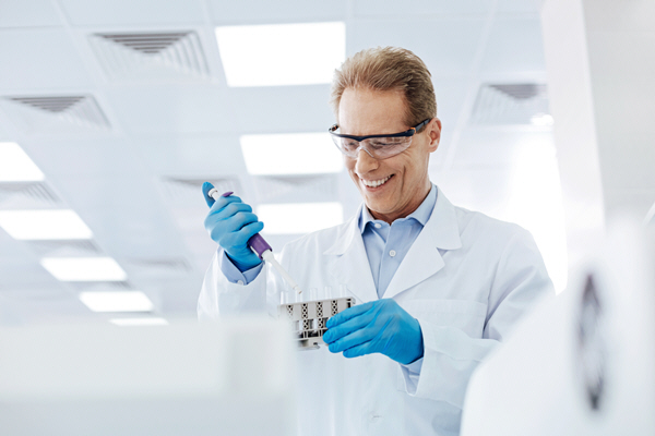 male doctor performs blood analysis male doctor performs blood analysis