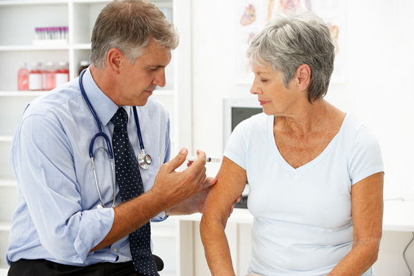 male doctor takes sample from female patient male doctor takes sample from female patient