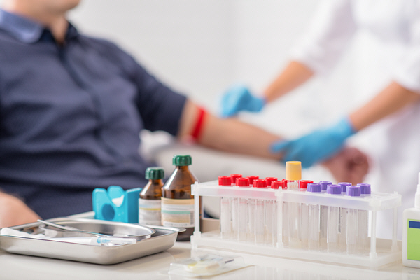 nurse prepares patient for taking blood sample nurse prepares patient for taking blood sample