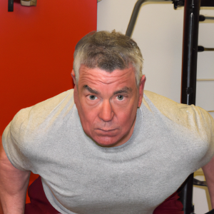 a professional appealing image of a caucasian man or woman exercising in a gym 373 300x300