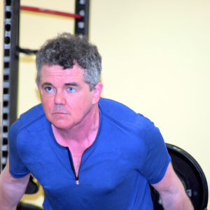 a professional appealing image of a caucasian man or woman exercising in a gym 433 300x300