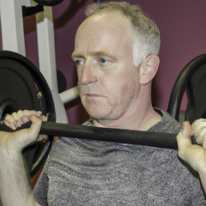 a professional appealing image of a caucasian man or woman exercising in a gym 760 300x300