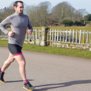 a professional appealing image of a caucasian man or woman jogging on a sunny day 658 300x300