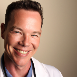 a professional and visually appealing good looking and atheletic image of a 35 to 45 year old happy smiling male caucasian doctor with white teeth 764 300x300